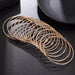 Women's Gold Multi-layered 14 Piece Stacked Bangle