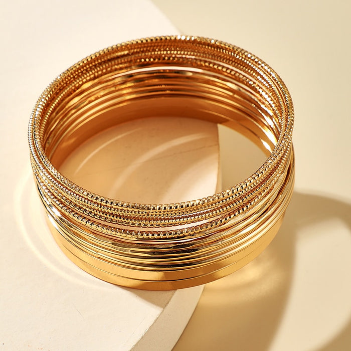 Women's Gold Multi-layered 14 Piece Stacked Bangle