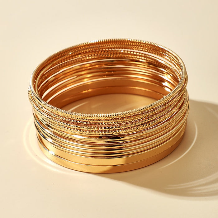 Women's Gold Multi-layered 14 Piece Stacked Bangle